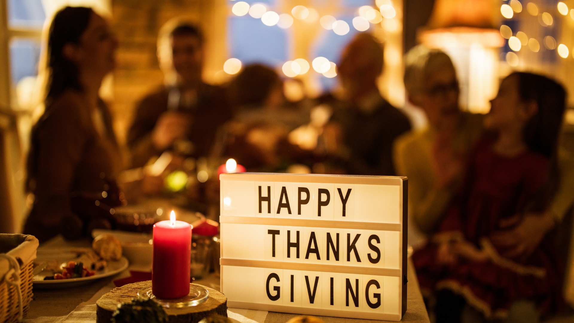 A family enjoying a calm, sensory-friendly Thanksgiving dinner together, illustrating the connection between Thanksgiving and autism