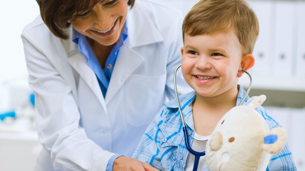 Doctor meeting with a young child during a developmental pediatrician appointment