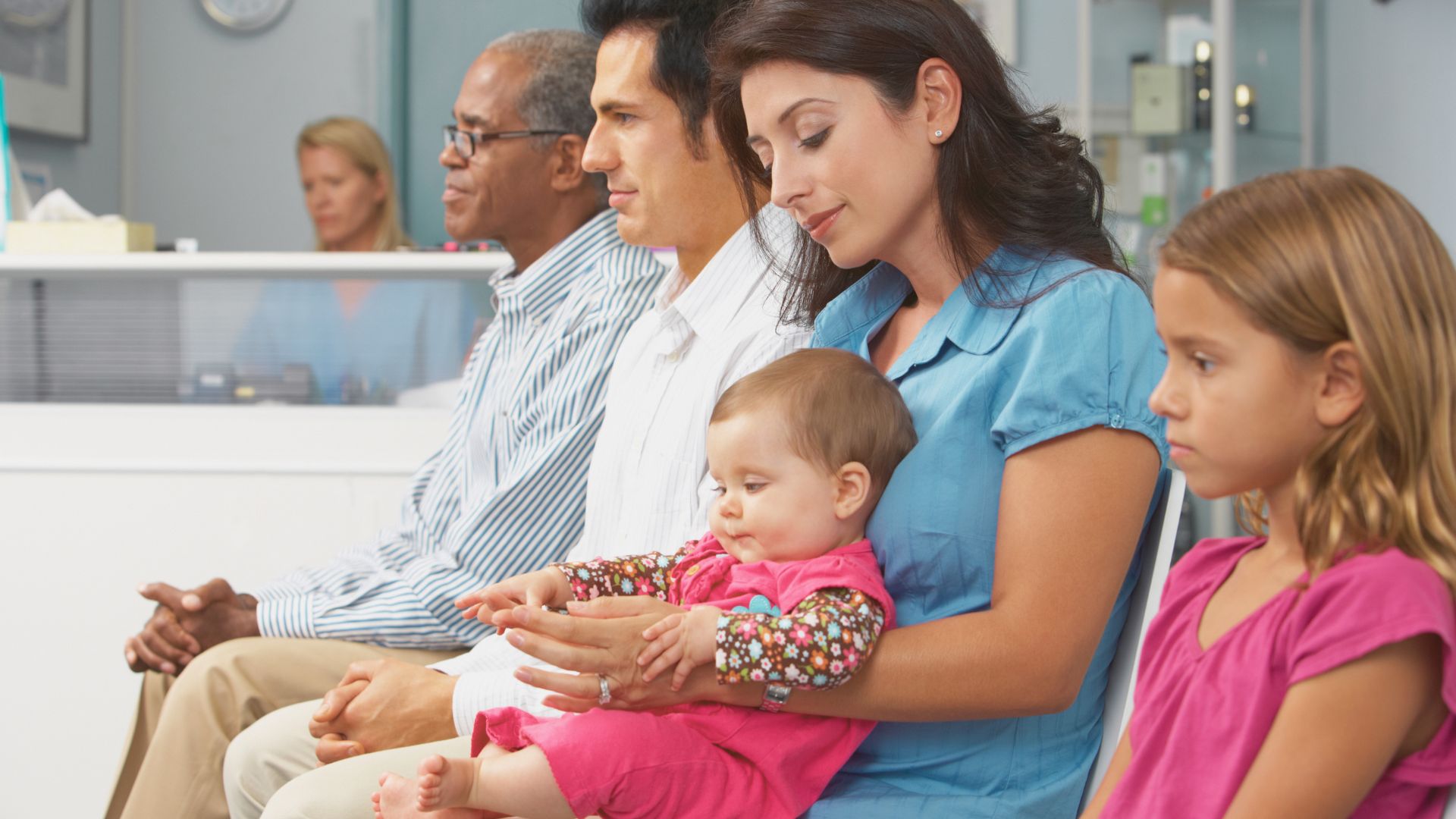 Children waiting in a pediatric clinic during an autism evaluation appointment